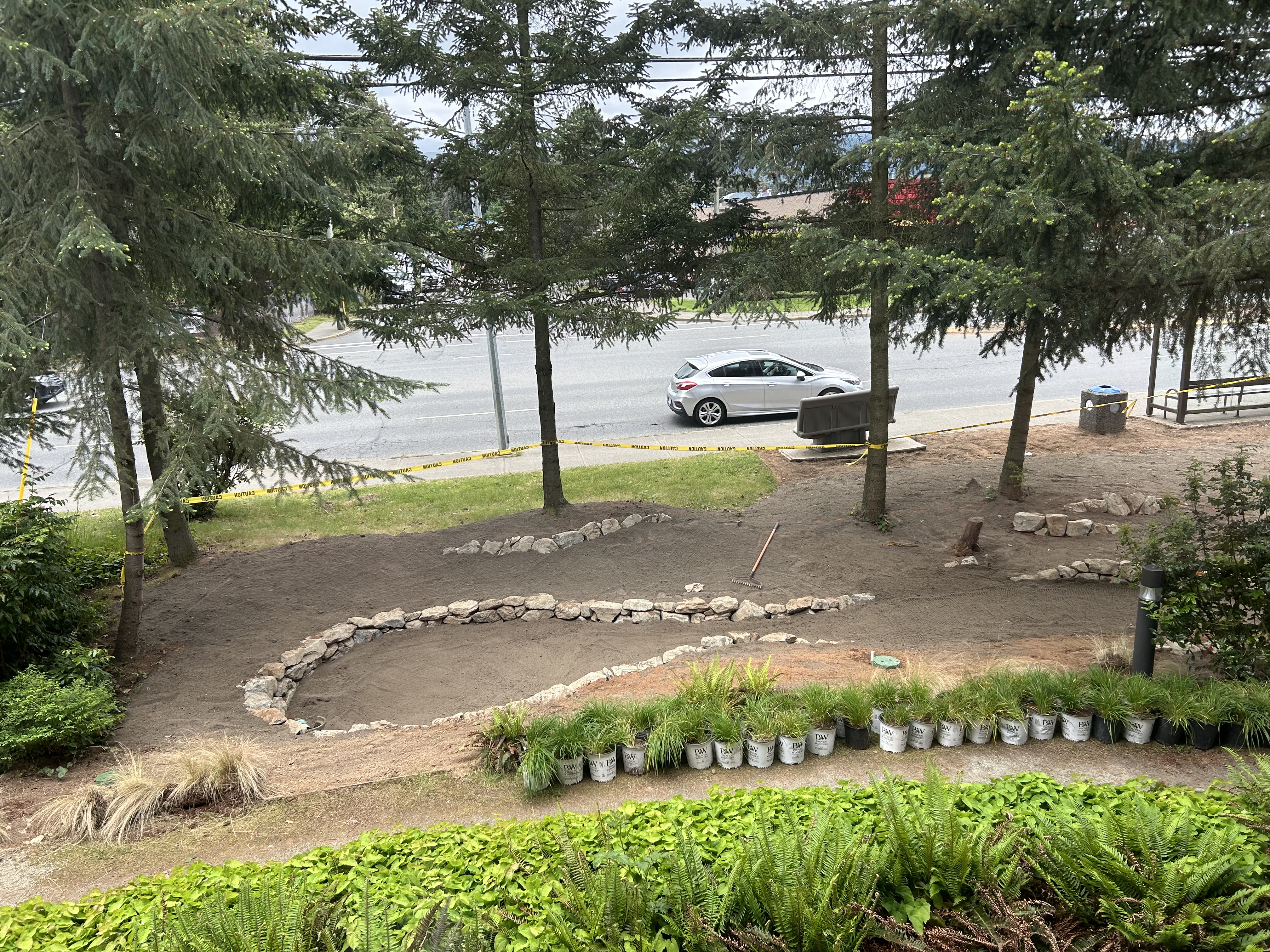 Rain garden rockwork installation